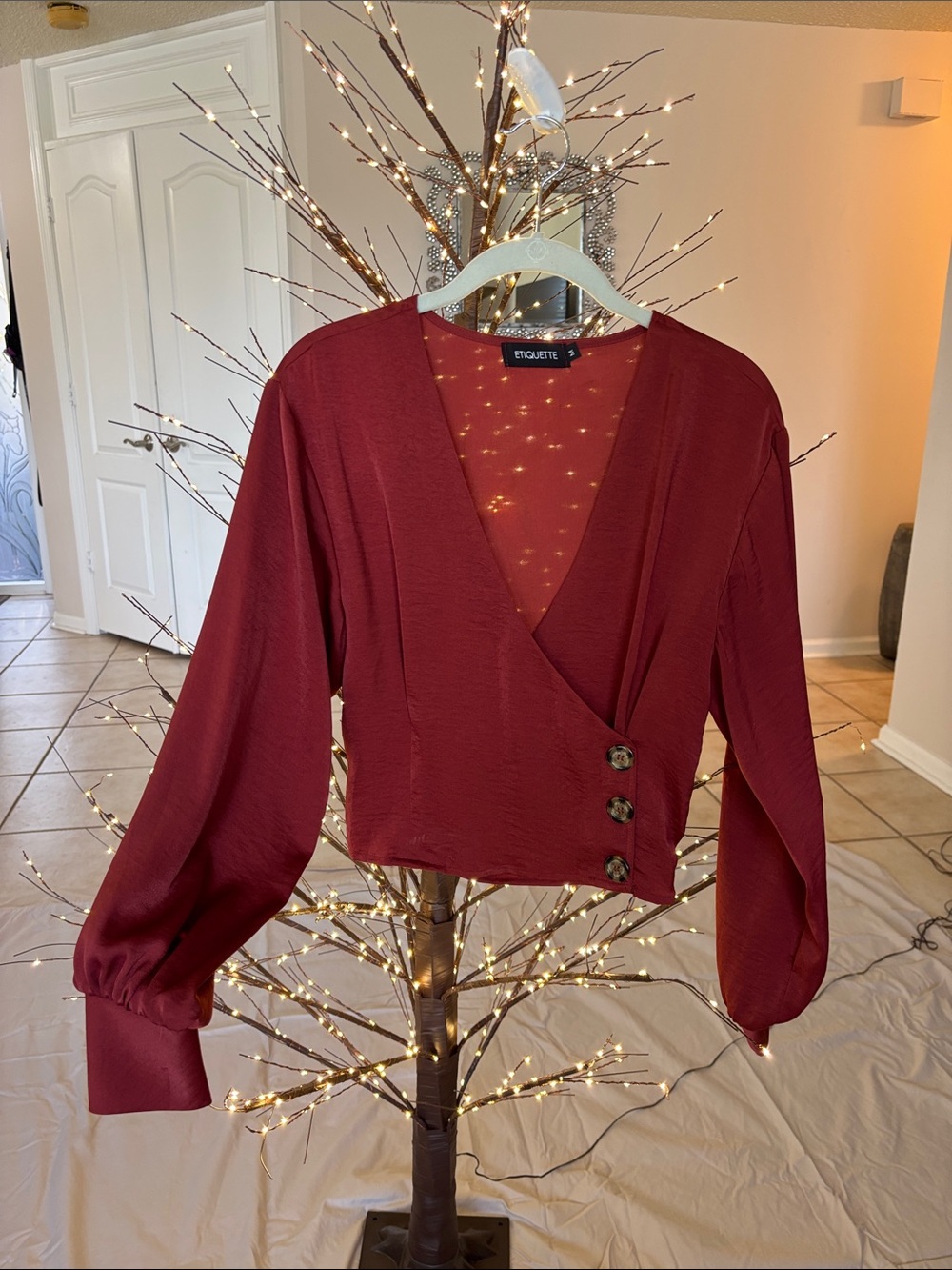 Etiquette Clothiers Wine Red Wrap-Front Blouse with Side Buttons